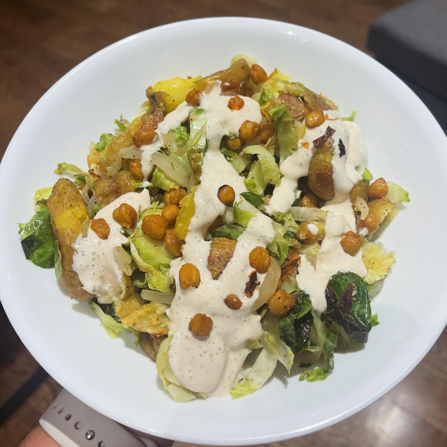 brussels sprouts salad with smashed potatoes and roasted chickpeas