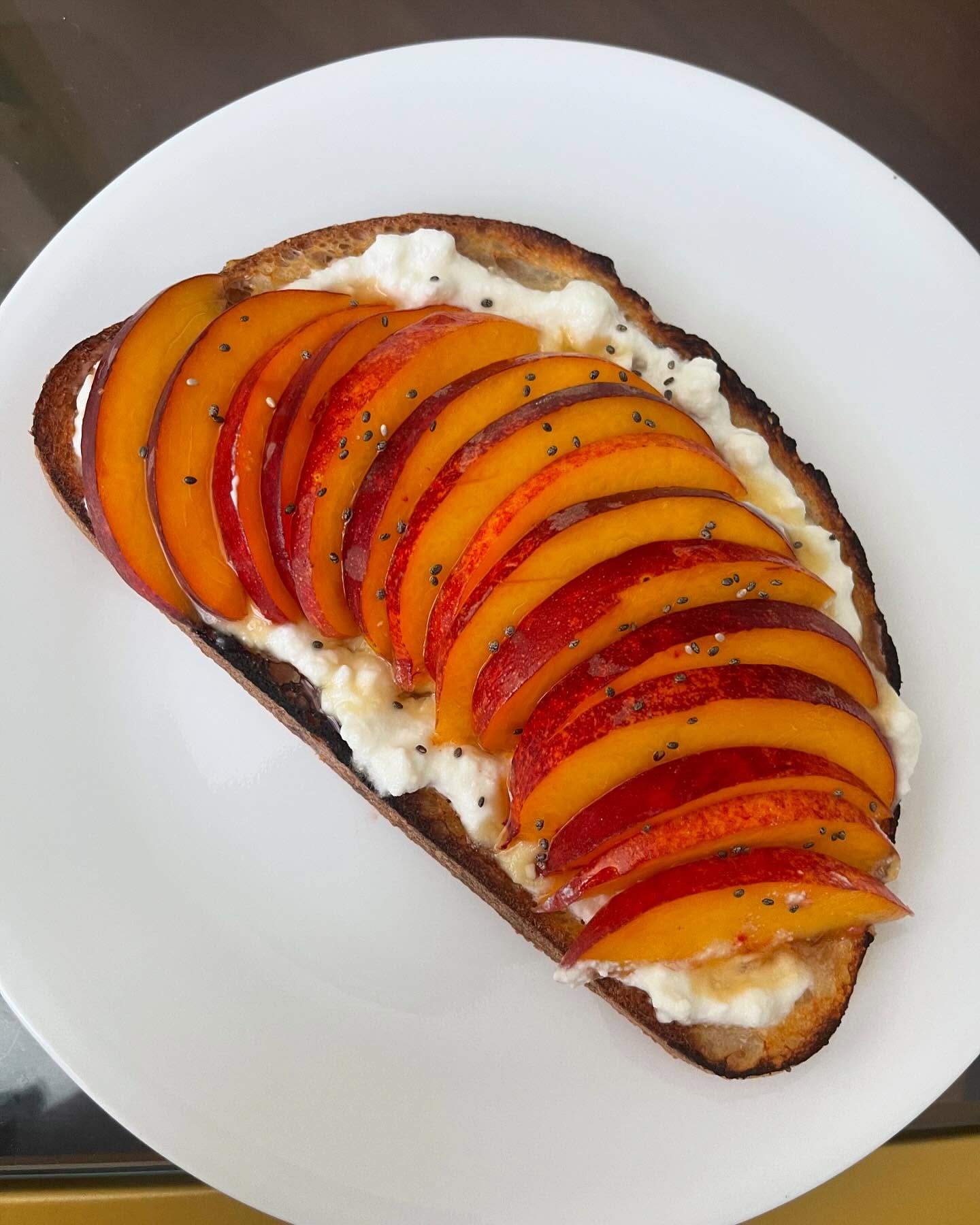 peach + ricotta & cottage cheese toast (drizzled w honey and chia seeds)