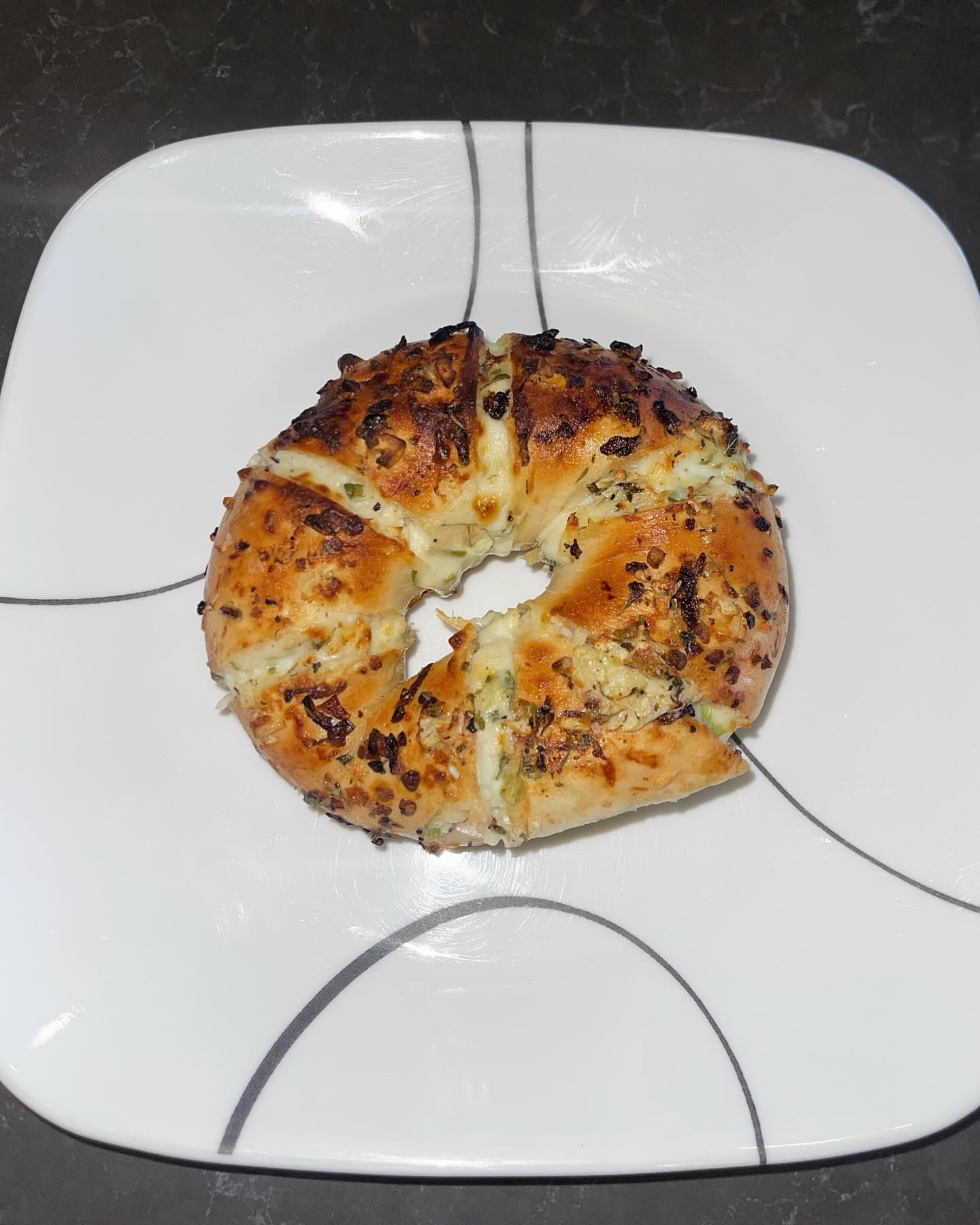 air fried bagel w chive cream cheese and garlic butter